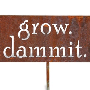 grow. dammit. Metal Garden Marker Stake Sign 21 to 28 Inches Tall Rusted Steel (shown)