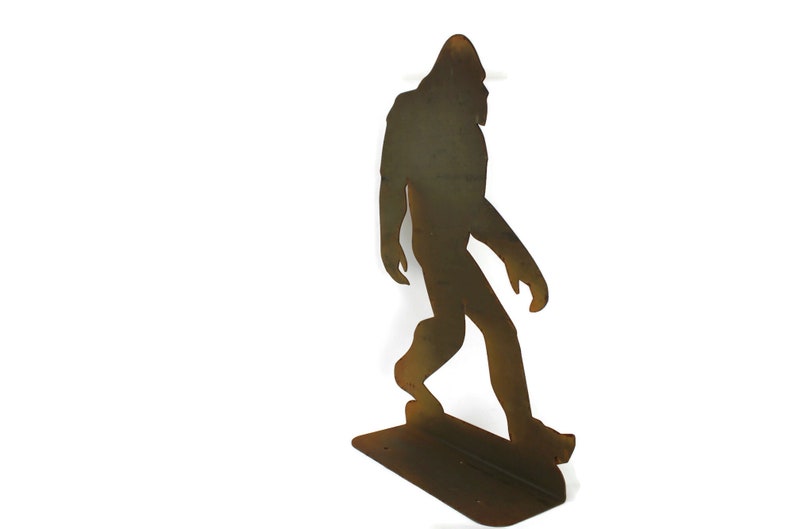 May include: A set of three ceramic mugs with a speckled, matte finish. The mugs are in shades of cream, light gray, and dark gray. Each mug has a simple, minimalist design, perfect for coffee or tea. The mugs are approximately 4 inches tall.