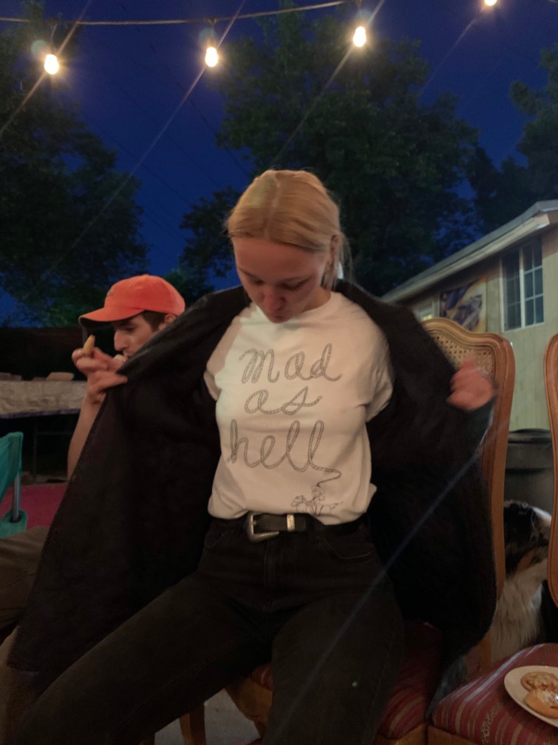 MEELZ Original Mad As Hell Cowgirl White T-Shirt