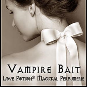 May include: A woman with long dark hair wearing a white ribbon tied in a bow around her neck. The text "Vampire Bait" is written in large black letters below the image. The text "Love Potion® Magickal Perfummerie" is written in smaller black letters below the larger text.