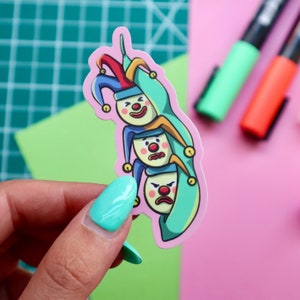 Cartoon Green Peas as Circus Jesters Sticker – Playful Vinyl Decal for Laptops, Water Bottle