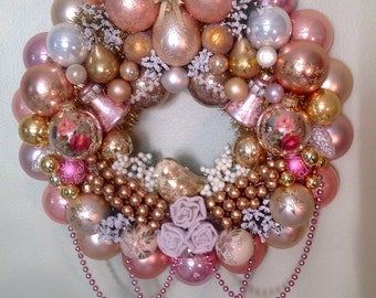 Waywardvisionstudio  spring wreath. Victorian, Vintage pinks, gold and peach ornaments.