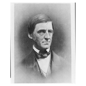 May include: Black and white portrait photograph of a man with a mustache and a bow tie. He is wearing a suit jacket and a vest. The photo is in a vintage style.
