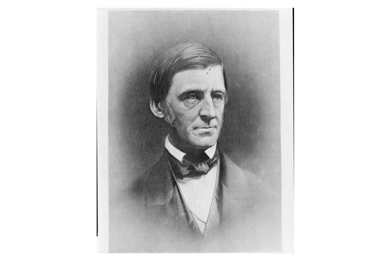 May include: Black and white portrait photograph of a man with a mustache and a bow tie. He is wearing a suit jacket and a vest. The photo is in a vintage style.