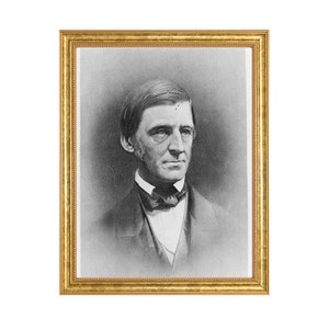 May include: A black and white portrait of a man in a framed photograph. The man is wearing a dark suit with a white shirt and a bow tie. He has a serious expression on his face.
