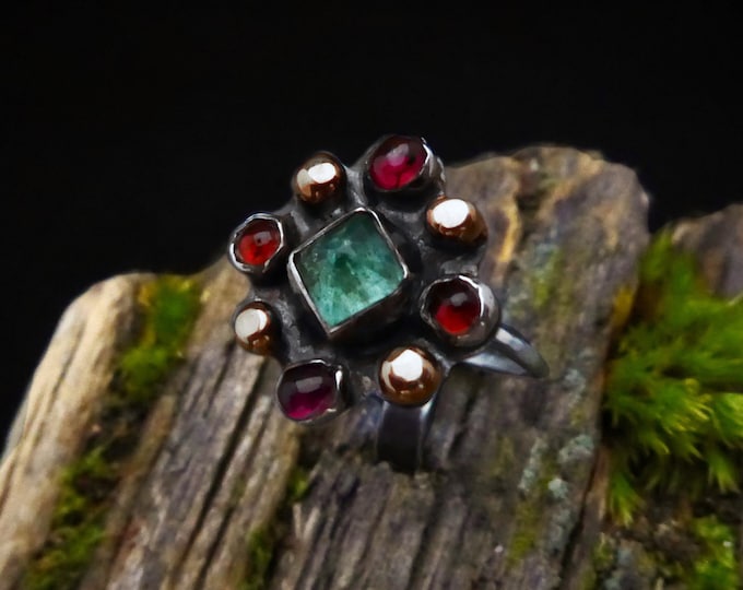 Emerald and Garnet Halo Ring