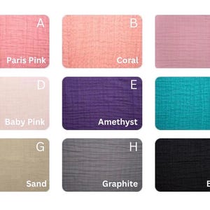 May include: Nine fabric swatches in various colors, each labeled with a name. Colors include Paris Pink, Coral, Rose, Baby Pink, Amethyst, Teal, Sand, Graphite, and Black. The fabric appears to have a textured, crinkled appearance.