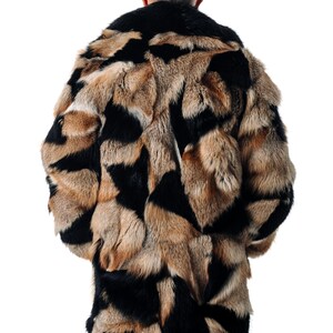 May include: A long, brown and black fur coat with a geometric pattern. The coat is made of a soft, luxurious fur and has a classic, timeless design.