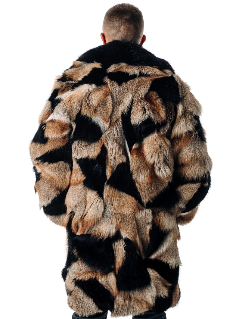 May include: A long, brown and black fur coat with a geometric pattern. The coat is made of a soft, luxurious fur and has a classic, timeless design.