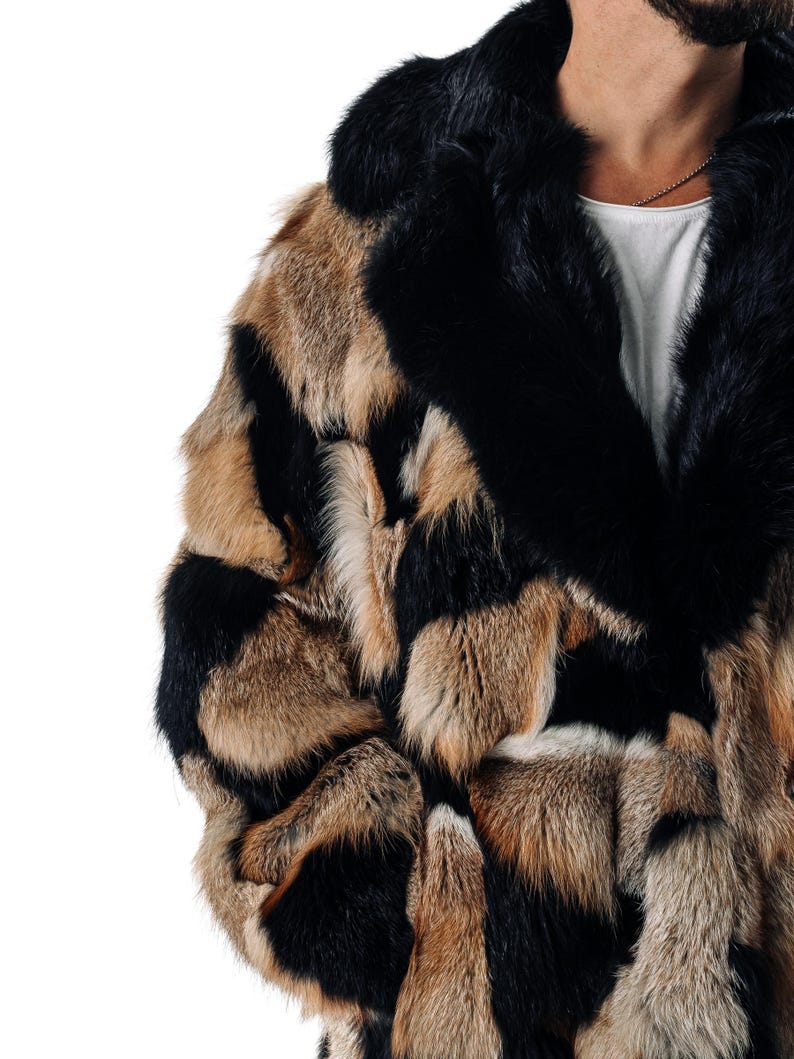 May include: A black and brown patterned fur coat with a large black fur collar.