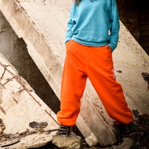 Orange sweatpants mens store
