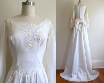 Vintage 1950s-60s || &#39;Augusta&#39; || White Bridal Gown with Asymmetrical Neckline, Beaded Floral Embroidery, and Detachable Train || Small