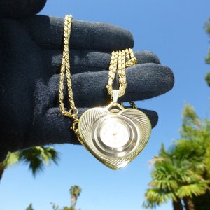 Vintage carravelle-hart hanger horlogeketting: goudkleurige mechanische opwinder