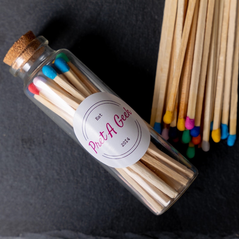 Rainbow Candle Matches, in glass jarr with cork lid, branded with PretAGeek sticker on the front, with sticker on rear of bottle, multicoloured matches, 20 matches, refills can also be ordered.