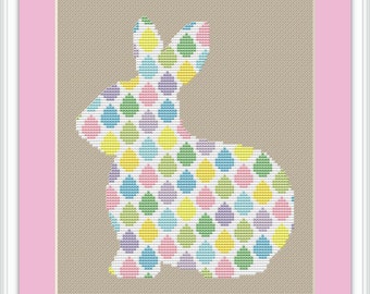 Easter Bunny cross stitch pattern; white rabbit with small eggs in pastel spring colours, perfect for beginners