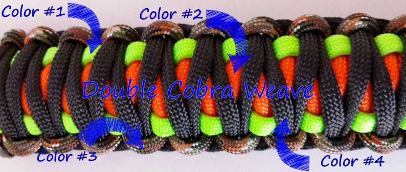 May include: Close-up of a double cobra weave paracord bracelet with four colors: camouflage, black, lime green, and orange. The bracelet is made with a double cobra weave pattern, which creates a strong and durable bracelet.
