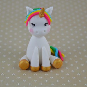 Edible fondant unicorn cake topper