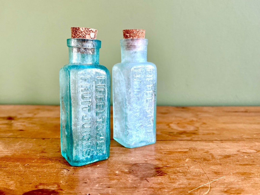 A Pair of Vintage eiffel Towers Lemonade and Fruit Juice Bottles Etsy
