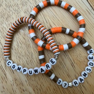 Compuware Armbanden met hockeythema - hockey voor jongeren