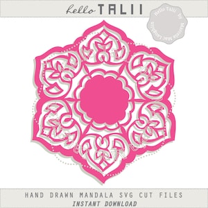 May include: A layered, pink and white mandala design with intricate floral and geometric patterns. The design features the text "hello TALII" at the top and "HAND DRAWN MANDALA SVG CUT FILES INSTANT DOWNLOAD" at the bottom. A circular logo with text is in the upper right corner.