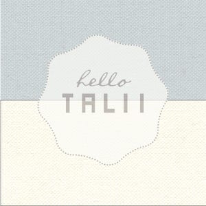May include: A white background with a light blue circle with the text "hello TALI" in grey.