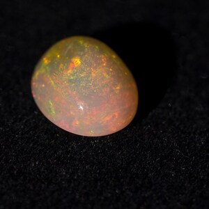 3.3 cts Bold Rainbow Red Multicolor Ethiopian Welo Opal