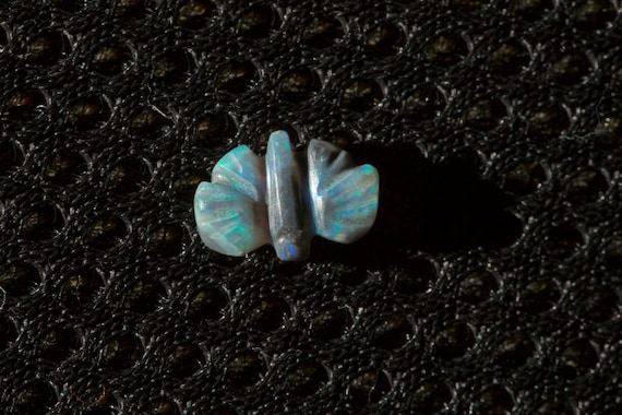 Green Galaxy Semi-BlackOpal butterfly with green & blue fire Opal Carving - 1 cts