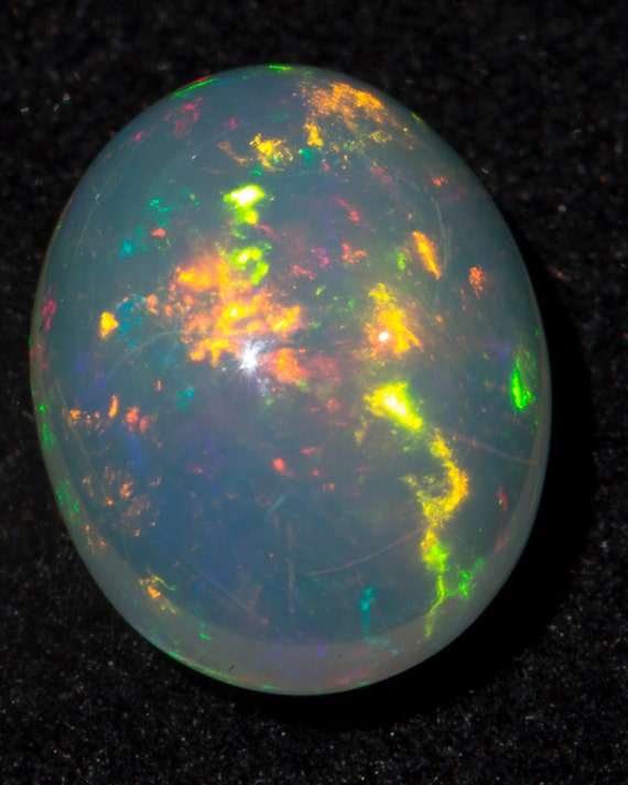 SALE **** 8x10 mm Ethiopian Welo Opal Cab Amazing and Incredible Rainbow fire was 127 each