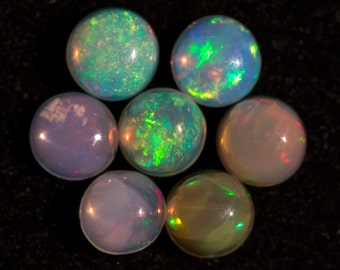 Sale **** 4 mm Round Ethiopian Opal Cabs Amazing and Incredibile Rainbow fire  was 12 each