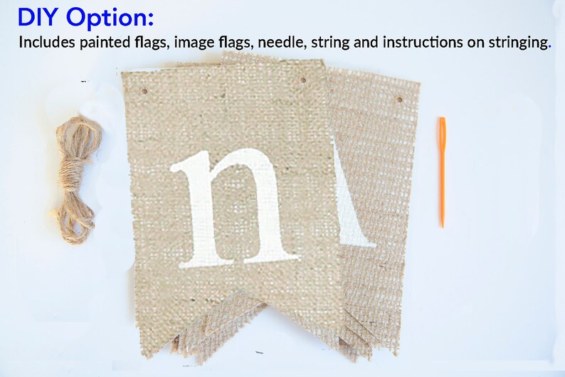 May include: DIY burlap banner kit with two flags, a needle, string, and instructions. The flags are beige with white letters that spell "m" and "a".