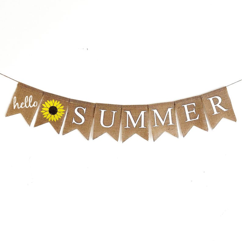 May include: A burlap banner with the words "hello summer" and a sunflower graphic. The banner is strung together with twine.
