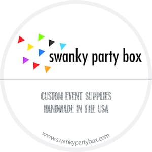 May include: A white circle with a black and white logo that says "swanky party box" in all caps. Below the logo, it says "CUSTOM EVENT SUPPLIES" and "HANDMADE IN THE USA" in a silver glitter font. Below that, it says "www.swankypartybox.com" in black text.