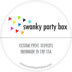 May include: A white circle with a colorful confetti design and the text "swanky party box" in black. Below the text is "CUSTOM EVENT SUPPLIES HANDMADE IN THE USA" in silver glitter text. The bottom of the circle has the website address "www.swankypartybox.com" in black text.