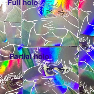 May include: Holographic stickers featuring a stylized illustration of a person with their hand covering their face. The stickers have a rainbow color effect and the text "Full holo" and "Partial holo".