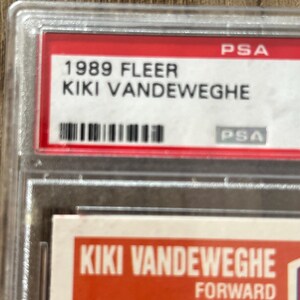 May include: A 1989 Fleer Kiki Vandeweghe trading card, encased in a protective PSA holder. The card features the player's name and the word "FORWARD". The PSA label is red and white.