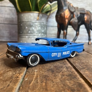 Petite voiture à friction Impala City Police Cruiser vintage 1958