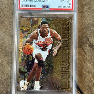 Carta da basket Fleer Metal NBA 1996 - Dikembe Mutombo - Atlanta Hawks - PSA EX 6