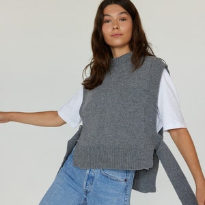 Long knitted merino wool sweater vest, chunky knit minimalist aesthetic winter clothing, oversized gray womens jumper vest