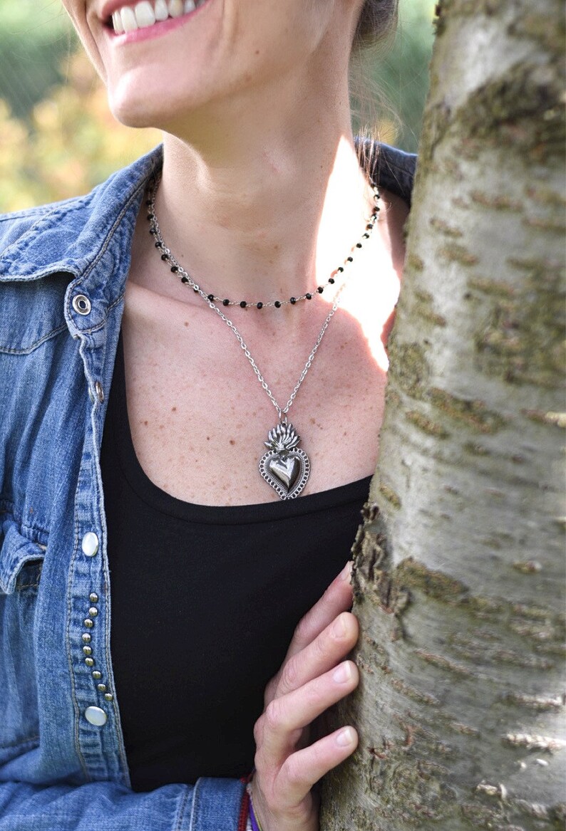 Necklace with sacred heart.