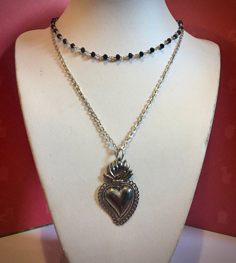 Necklace with sacred heart.