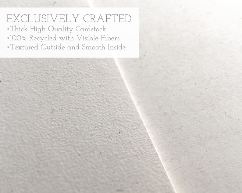 May include: Close-up of a white textured cardstock. The text "EXCLUSIVELY CRAFTED" is printed at the top of the cardstock. The text below reads: "&bull;Thick High Quality Cardstock &bull;100% Recycled with Visible Fibers &bull;Textured Outside and Smooth Inside"