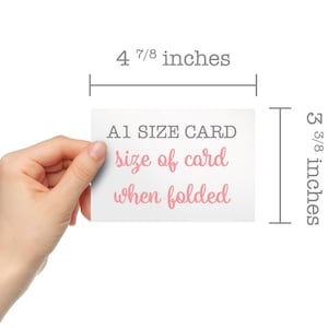 May include: A white card with the text "A1 SIZE CARD" in black and "size of card when folded" in pink. The card is 4 7/8 inches wide and 3 3/8 inches tall.