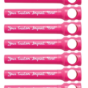May include: Set of seven pink bottle stoppers with a white imprint that says "Your Custom Imprint Here!"