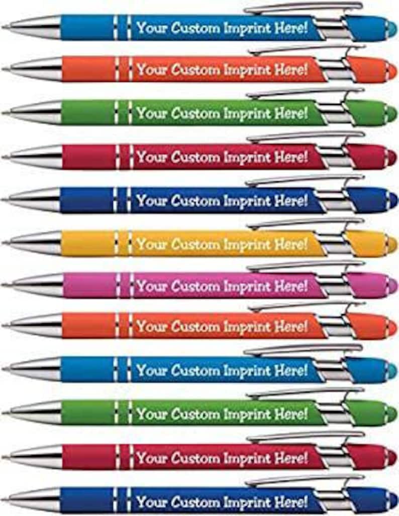 May include: A set of 12 pens with a variety of colors, including blue, red, green, yellow, orange, and pink. Each pen has a silver clip and a clear plastic barrel with a white imprint that says "Your Custom Imprint Here!"
