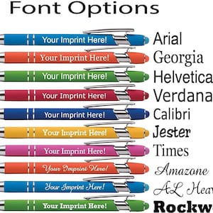 May include: A set of ten pens with different colored barrels and different font styles. The pens are all the same size and shape. The text on the pens reads "Your Imprint Here!" and the font styles are Arial, Georgia, Helvetica, Verdana, Calibri, Jester, Times, Amazone, AL Heavenly, and Rockwell.