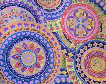 May include: A vibrant, colorful textile featuring a repeating pattern of overlapping circular designs. Each circle showcases intricate floral and geometric motifs in shades of blue, pink, orange, purple, and green. The overall effect is a lively and decorative design.