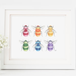 K&ouml;nnte beinhalten: Sechs bunte Hummeln, jede mit einer anderen Farbe, sind in zwei Reihen zu je drei angeordnet. Die Bienen sind in einem realistischen Stil mit detaillierten Markierungen und flauschigen K&ouml;rpern gezeichnet. Die Farben sind rot, orange, gelb, gr&uuml;n, blau und lila.