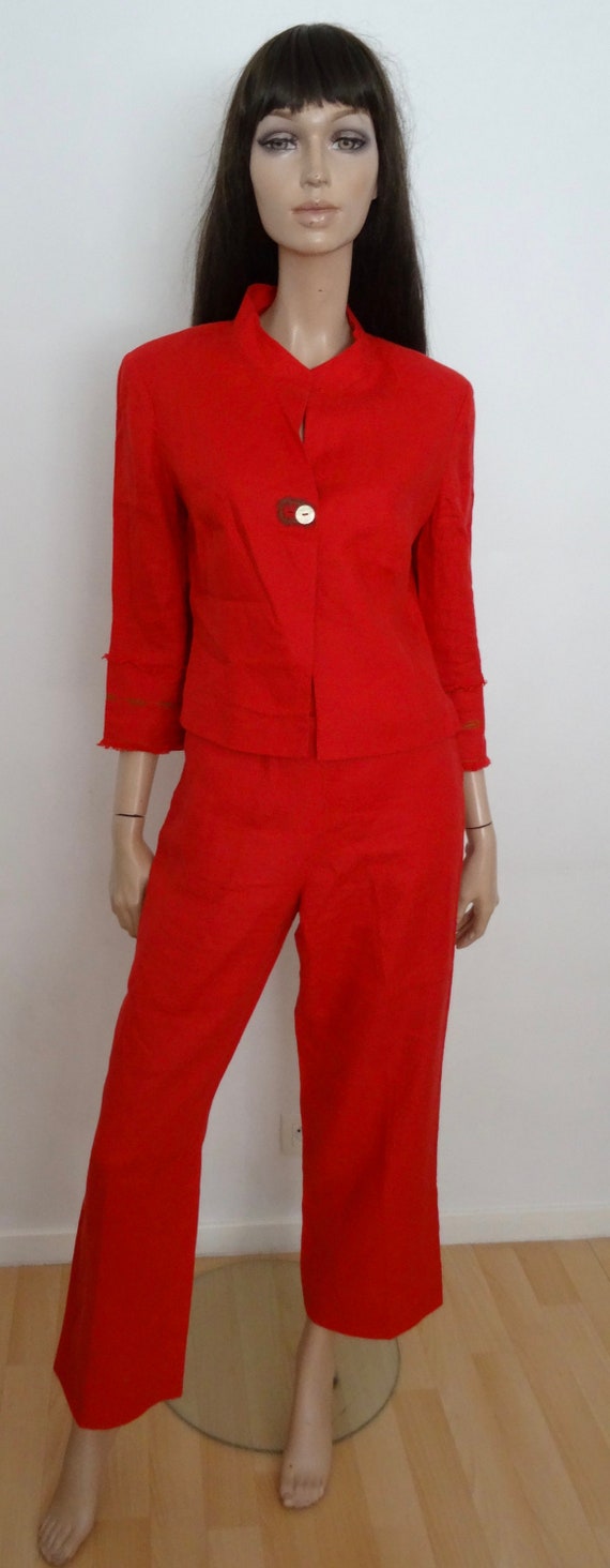 red trouser suit