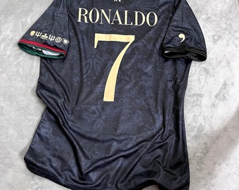 Maillot Ronaldo GOAT Portugal pour les fans 23-24 Portugal Édition spéciale Comma Football Ronaldo #7 Édition commune 2024 Cadeau pour lui Cadeau