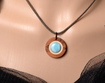 Larimar pendants and precious wood jewelry. Selectable necklace length. Small series from Germany.